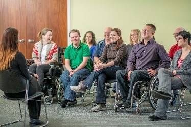 A group of people having a meeting. 