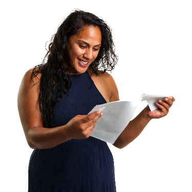 A woman reading a document. 