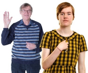 An older man and a young woman pointing at themselves. 