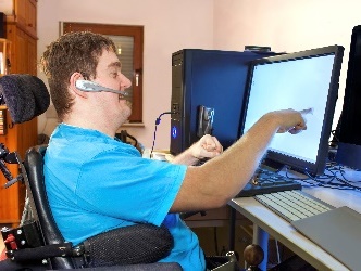A man using a computer. 